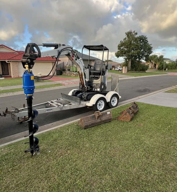 2t excavator fitted with auger attachment