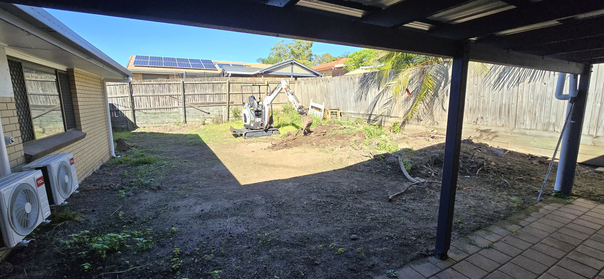Backyard vegetation and debris clearing