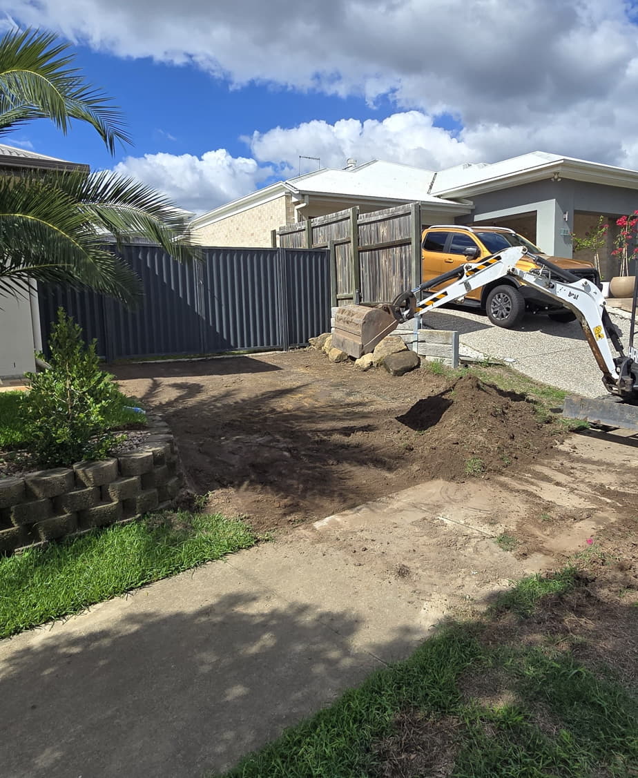 Ground levelling near retaining wall